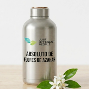 Stainless steel bottle with black block logo reading 'JUST DIFFERENT PEOPLE' and text 'ABSOLUTO DE FLORES DE AZAHAR' beside white flowers and green leaves on a light wooden surface.
